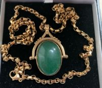 9ct GOLD PENDANT, ONE SIDE NEPHRITE JADE AND OTHER SIDE BLACK ONYX, WEIGHT APPROXIMATELY 14.4g. ALSO