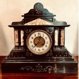 SLATE AND MARBLE MANTLE CLOCK IN THE CLASSICAL MANNER, APPROXIMATELY 39 x 43cm NOT TESTED