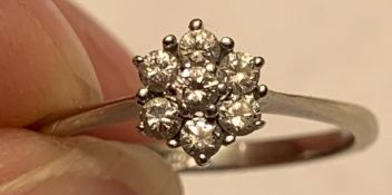 21ct WHITE GOLD RING WITH A CLUSTER OF SEVEN 0.07 DIAMONDS, SIZE M, WEIGHT APPROXIMATELY 2g