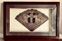 FRAMED AND GLAZED COMPOSITION- FAN, FASTENING AND DRAWER PULLS, FRAME SIZE APPROXIMATELY 52 x 34cm