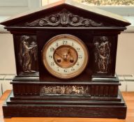 SLATE MANTLE CLOCK WITH CAST METAL PANELS IN THE CLASSICAL MANNER