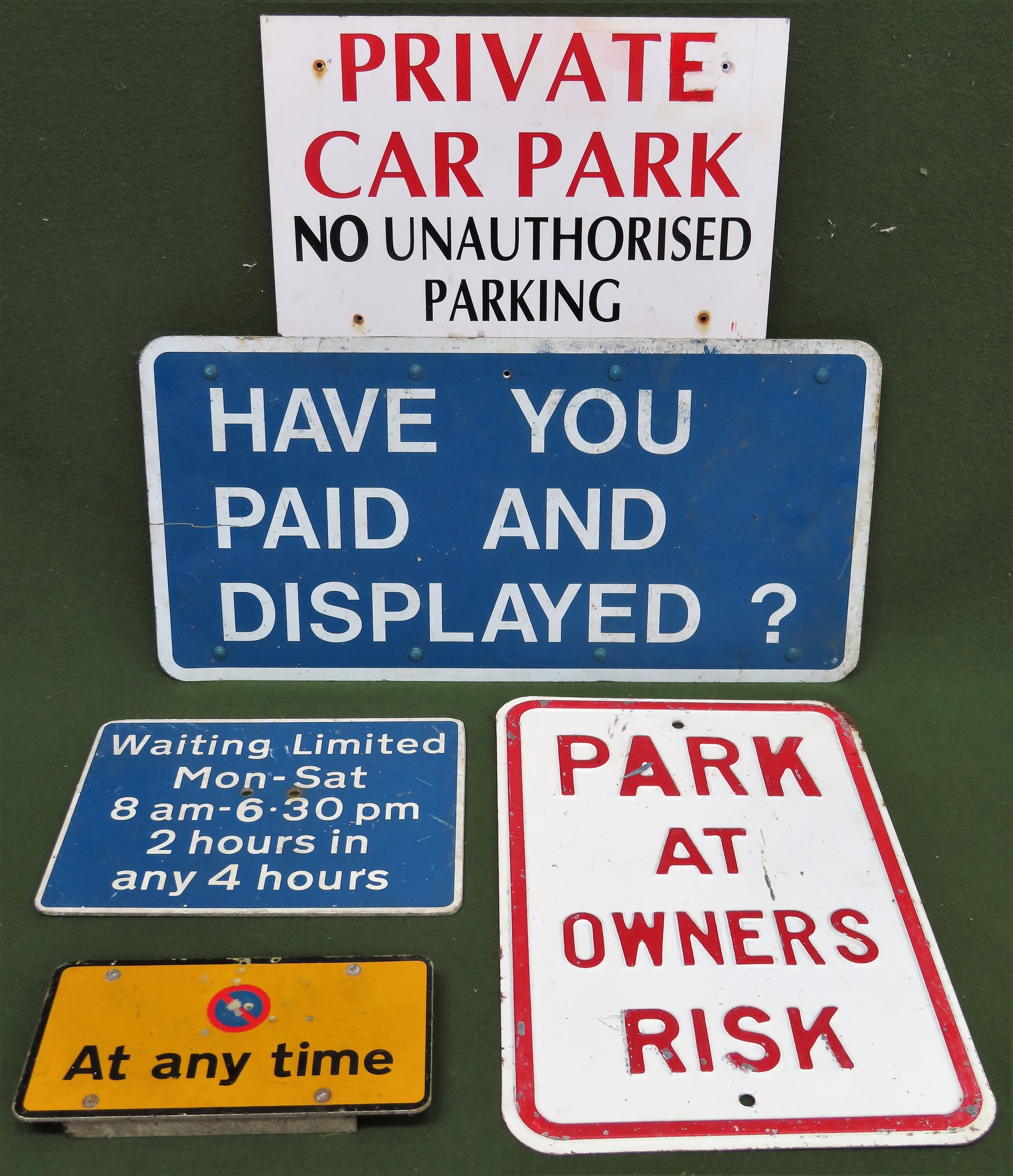 Five various parking related signs All in used condition