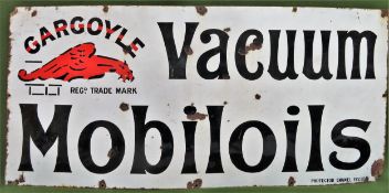 Gargoyle Vacuum Mobiloils vintage enamelled advertising sign. Approx. 61cms x 131cms used