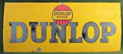 Dunlop Stock vintage enamelled advertising sign. Approx. 56cms x 130cms used condition. wear to