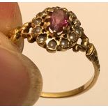 UNMARKED YELLOW METAL RING WITH AMETHYST AND TWELVE PEARLS, WEIGHT APPROXIMATELY 1.9g, SIZE L