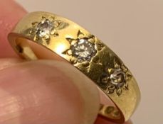 18ct GOLD RING WITH APPROXIMATELY ONE 0.15ct AND TWO 0.7ct DIAMONDS, WEIGHT APPROXIMATELY 3.3g, SIZE
