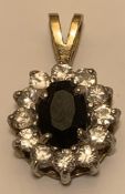 9ct GOLD PENDANT WITH APPROX 0.75ct BLUE SAPPHIRE AND TWELVE 0.3ct WHITE TOURMALINES, WEIGHT