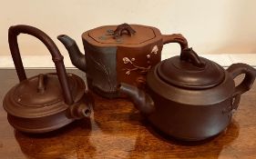 THREE SMALL JAPANESE TEAPOTS, BEARING MAKERS' STAMPS IMPRESSED