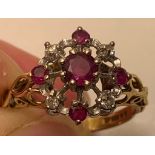 18ct GOLD RING WITH APPROX ONE 0.5ct AND FOUR 0.7ct RUBY AND FOUR 0.3ct DIAMONDS, WEIGHT