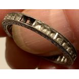 UNHALLMARKED WHITE METAL RING SET WITH FIVE DIAMONDS, AND OTHER CLEAR STONES (TESTED) TOTAL WEIGHT