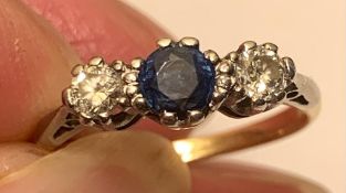 14ct GOLD RING WITH APPROX 0.33ct BLUE SAPPHIRE AND TWO 0.15ct DIAMONDS, WEIGHT APPROXIMATELY 2.