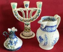 THREE SCONCE POTTERY CANDLESTICK, BLUE AND WHITE JUG, PLUS SMALL FLORAL DECORATIVE JUG