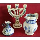 THREE SCONCE POTTERY CANDLESTICK, BLUE AND WHITE JUG, PLUS SMALL FLORAL DECORATIVE JUG