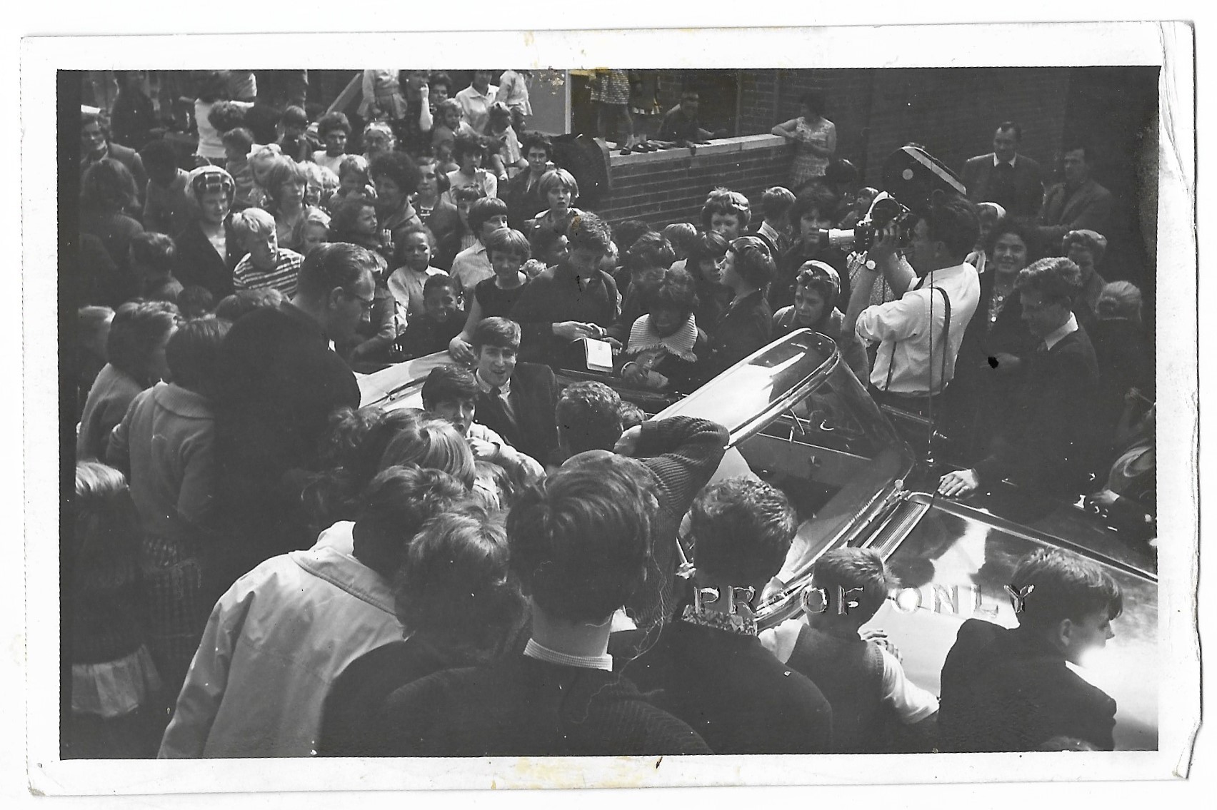 Two photographs of The Beatles in Liverpool 1962 by Peter Kaye both are marked Proof and are stamped