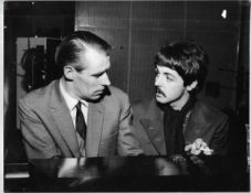 Two press photographs of Paul McCartney & George Martin during the recording of Sgt Pepper LP. These