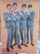 The Beatles Large Original 1960’s Poster featuring group in suits with orange background