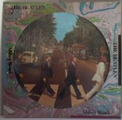 The Beatles Sgt Pepper Picture Disc PHO70277 issued 1979 and The Beatles Abbey Road Picture Disc
