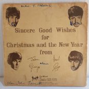 The Beatles 1963 Christmas Fan Club Single Flexi Disc Sleeve has some writing on it in blue pen