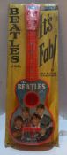 The Beatles Jnr Guitar by Selcol sealed and attached to original backing card. UK 1964