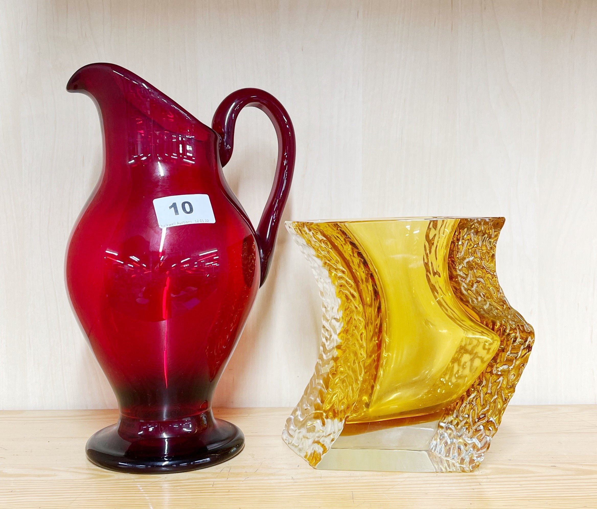 A large Whitefriars ruby glass jug, H. 27cm. Together with a Murano glass vase.