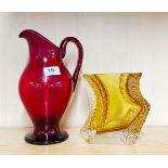 A large Whitefriars ruby glass jug, H. 27cm. Together with a Murano glass vase.