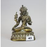 A 19th/ early 20th century Tibetan bronze figure of a seated Tara, H. 17cm.