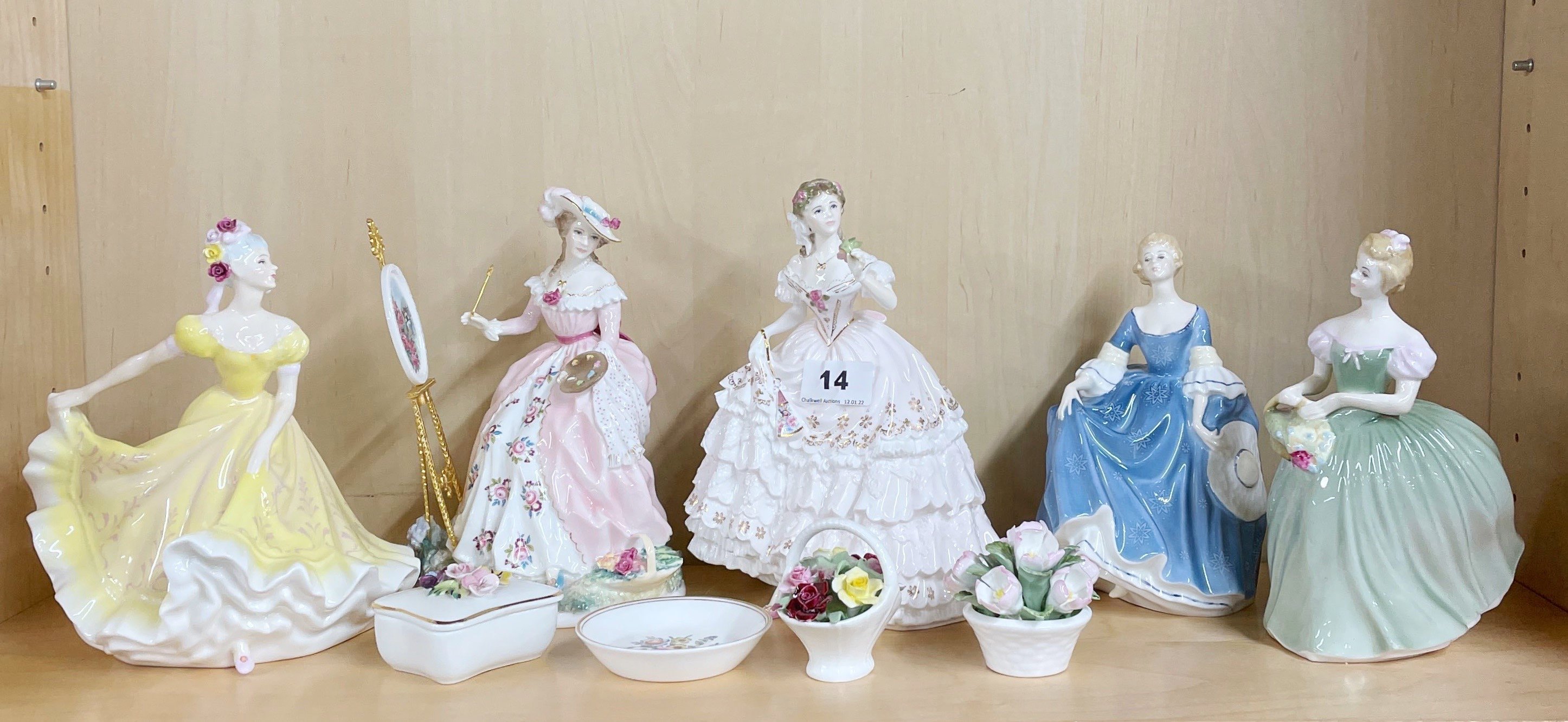 Three Royal Doulton figurines, together with two Worcester figurines, and four small porcelain