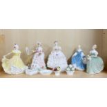Three Royal Doulton figurines, together with two Worcester figurines, and four small porcelain