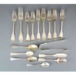 A group of mixed hallmarked silver cutlery items.