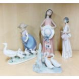 Three Lladro figurines of girls, tallest H. 25cm. Together with a Nao figurine of ducks.