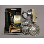 A silver plated dressing table set, etc.