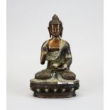 A Sino-Tibetan bronze figure of a seated Buddha, H. 20cm.