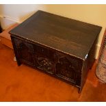 A 19th century carved oak chest, 66 x 43 x 41cm.