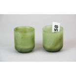 A pair of Chinese jade wine cups, H. 5.5cm.