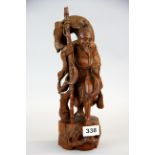 A mid 20th century Chinese carved hardwood figure of a fisherman, H. 31cm.