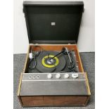 A vintage 1970's HMV portable record player.