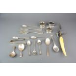 A Victorian ivory handled carving fork and a group of mixed silver items.