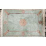 A heavy quality Chinese washed wool rug, W. 121cm.