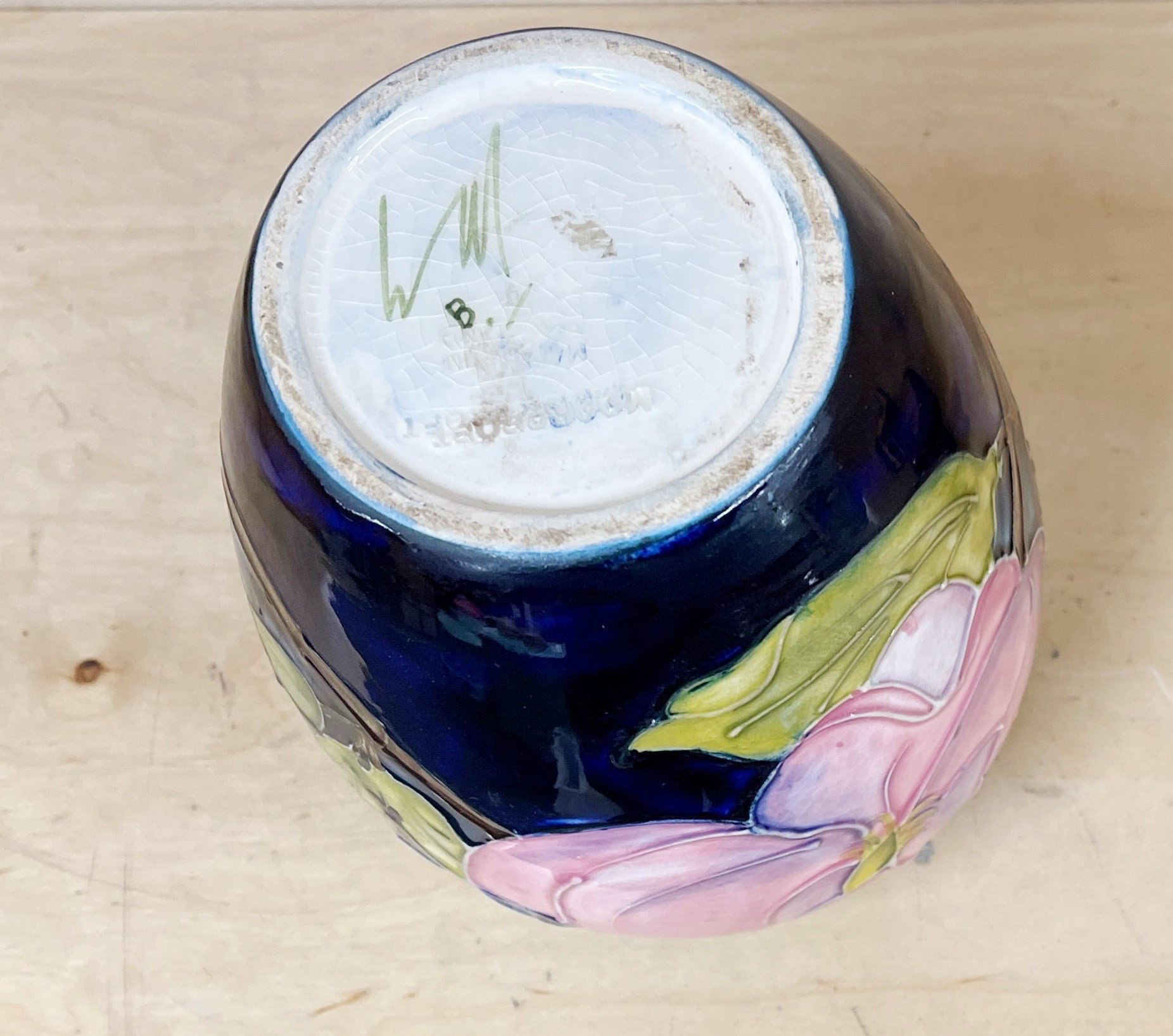 A Moorcroft hibiscus pattern jar and lid, H. 16cm. - Image 2 of 2