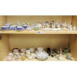 A large collection of small porcelain items.