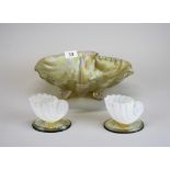 A pair of 19th century vaseline glass shell salts, mounted on oval mirrors, H. 7cm. Together with