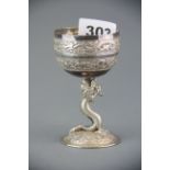 An early 20th century Chinese white metal (tested silver) presentation dragon duck/goose egg cup,