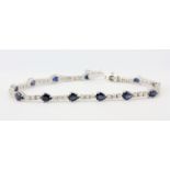 An 18ct white gold bracelet 2.03ct brilliant cut diamonds and 5.36ct of pear cut sapphires, L.