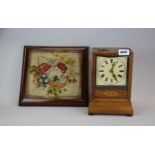 A 19th century walnut mantle clock and a tapestry kettle stand/ wall hanging.