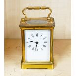 A gilt brass carriage clock, H. 14cm.