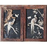 A pair of Japanese mother of pearl and carved bone decorated panels, 45 x 70cm. Together with a
