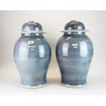 A pair of large Chinese grey porcelain jars and lids, H. 50cm.