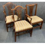 A group of nine Georgian upholstered mahogany dining room chairs.