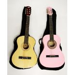 Two half size acoustic guitars.