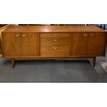 A 1970's teak sideboard, 213 x 44 x 81cm.